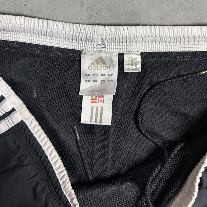 Adidas Vintage Trackpants Baggy Fit Größe M/L(Bilder können nicht ausgeschnitten werden )